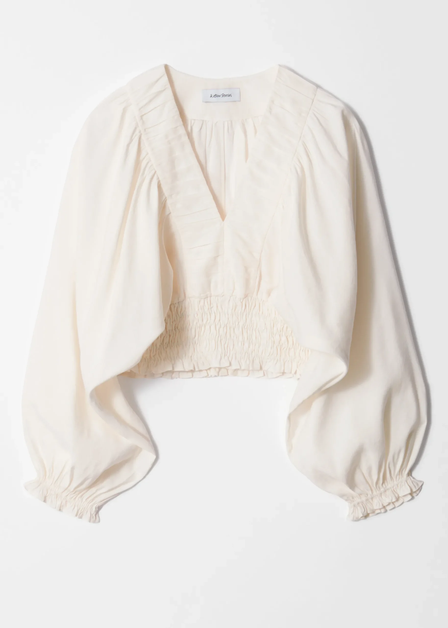 & Other Stories Gesmokte Bluse mit Puffärmeln