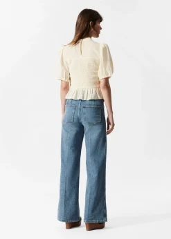 & Other Stories Gesmokte Bluse mit Schößchen