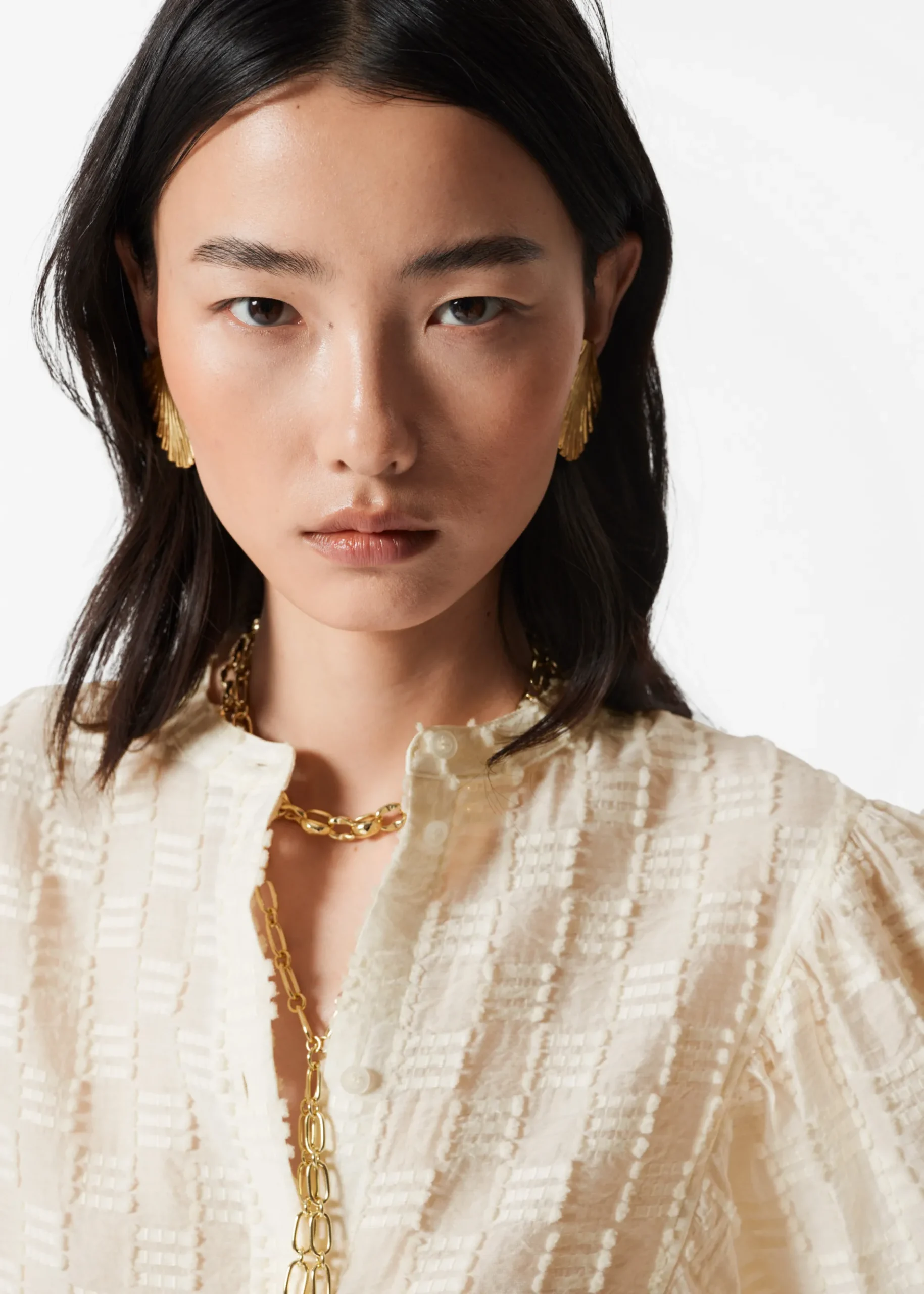 & Other Stories Strukturierte Bluse mit voluminösen Ärmeln