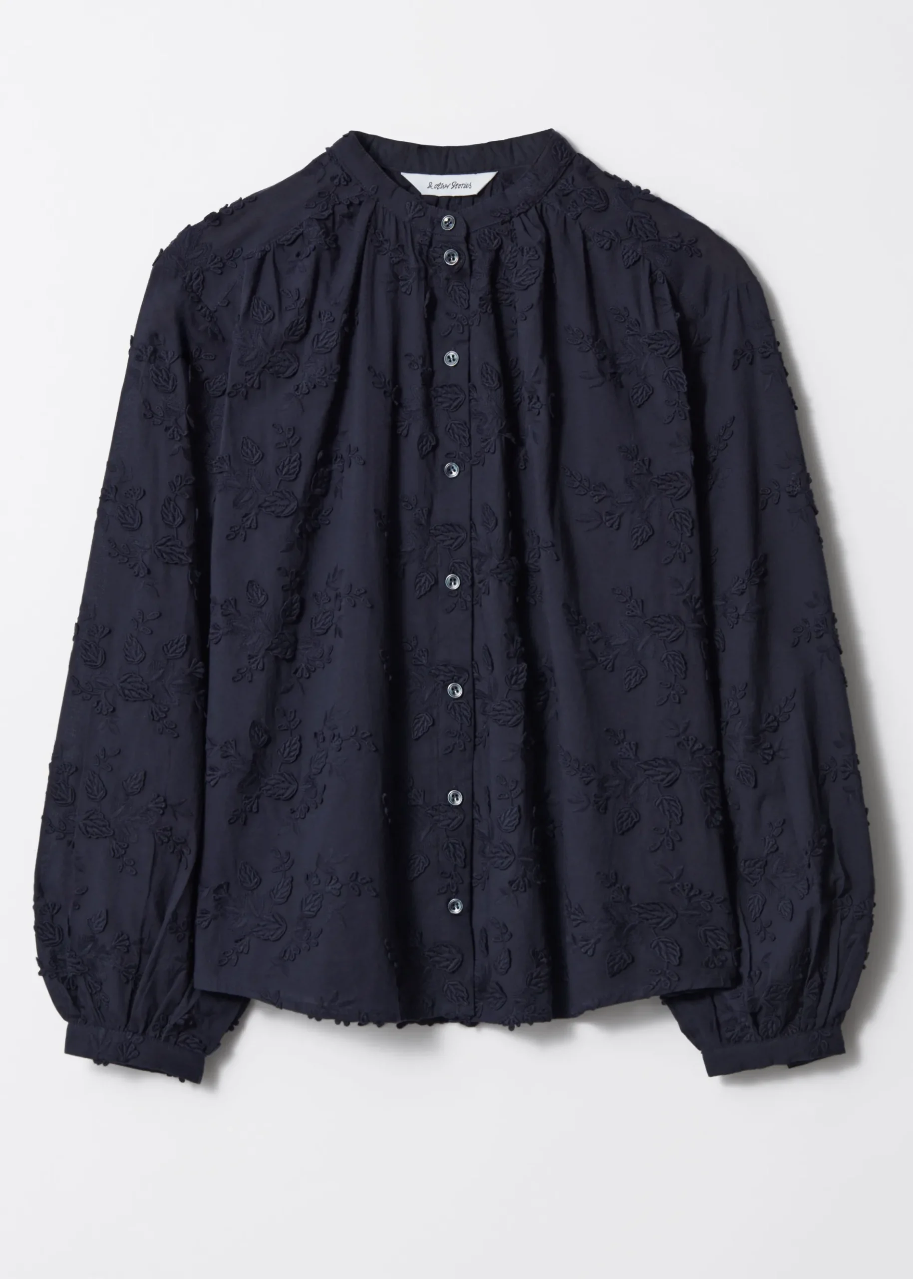 & Other Stories Voluminöse Bluse mit Blumenapplikation